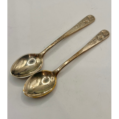 41 - Eleven Sterling Silver Decorative Tea Spoons In Box. 9.5cm x 2cm, Total 76.8Grams.  (11)