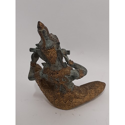 84 - Bronze Thai Musician in seated position, 14cm x 11cm