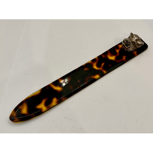 48 - Antique Tortoiseshell Book marker With Raises White Metal Bores Head Decoration. 18cm x 2.5cm x 3cm.