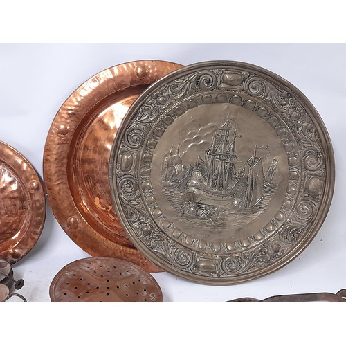 115 - Copper an Brass wall hanging Platters chestnut roasters copper burner, candlestick,      (8)