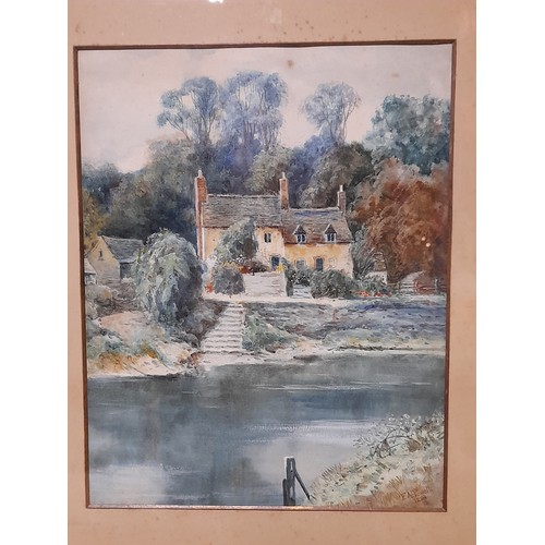 116 - Framed and Glazed watercolour of a Cottage by a River, signed and dated lower right E A Powell 1881,... 