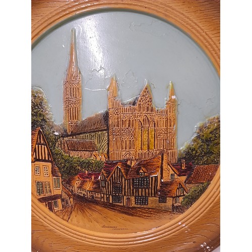 295 - Plaster wall plaque depicting Salisbury Cathedral, 39cm diameter