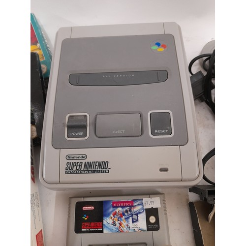 533 - Super Nintendo Console and Games