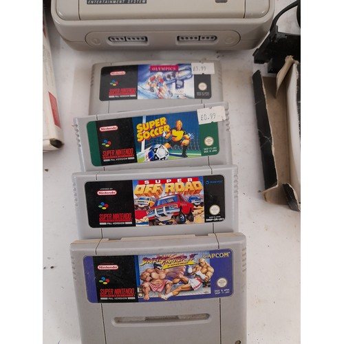 533 - Super Nintendo Console and Games