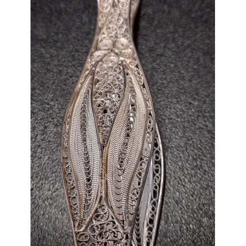 560 - Silver coloured Sugar Tongs with Filigree wire work, 14cm long