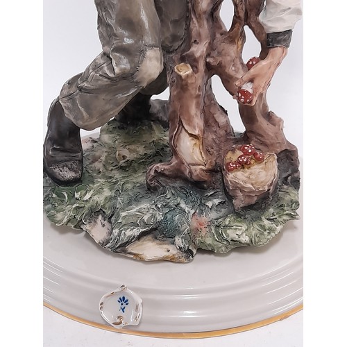 562 - Large Capodimonte Figure of an Old Man Picking Mushrooms,  30cm high x 26cm wide