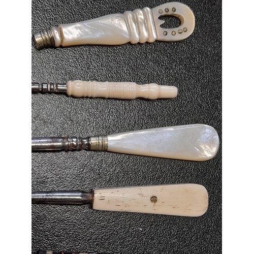 581 - 7 x Button Hooks with handles from Mother of Pearl, bone etc plus a Mother of pearl Handle.      (8)