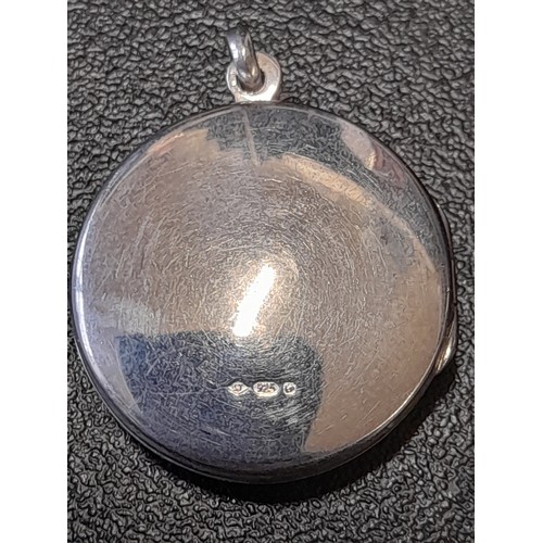 583 - Small Silver Locket Stamped 925 with 'through the keyhole' view of topless woman