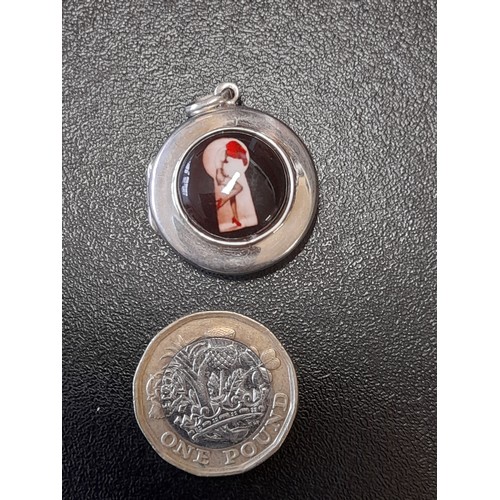 583 - Small Silver Locket Stamped 925 with 'through the keyhole' view of topless woman