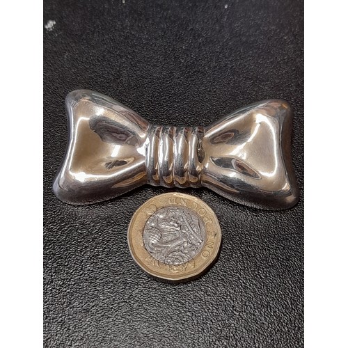 589 - Silver Brooch in the form of a Bow, Stamped 925, 6cm long x 3cm wide