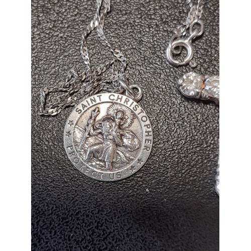 593 - Silver St Christopher on chain with a Silver Cross, both marked 925