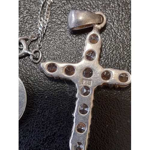 593 - Silver St Christopher on chain with a Silver Cross, both marked 925