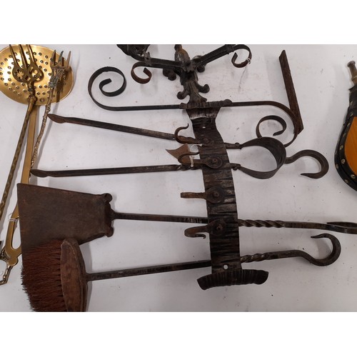 644 - Wrought Iron Companion set , 2 Brass Toasting forks etc contained in a fireside Bucket    (11)