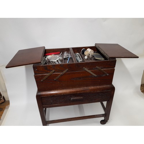 679 - Sewing Box on Casters, Cantilever Top above Drawer, With Some Contents, 49cm x 30cm x 58cm