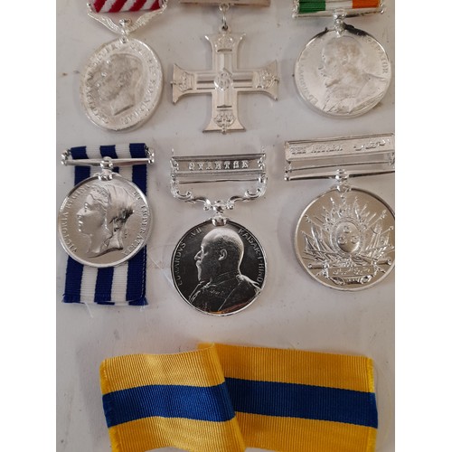 175 - 6 x Replica Military Medals and a Ribbon