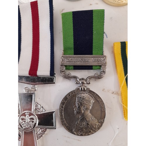 176 - 7 x Replica Military Medals and a Ribbon