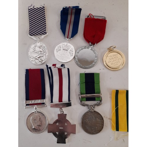 176 - 7 x Replica Military Medals and a Ribbon