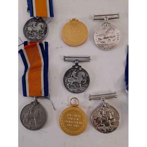 177 - 7 x Replica Military Medals and a Ribbon