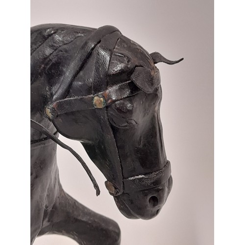 198 - Leather Horse Figure, 32cm x 27cm