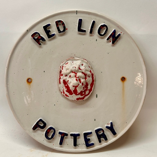 431 - Circular Ceramic Plaque Advertising Red Lion Pottery. 26cm x 4cm.