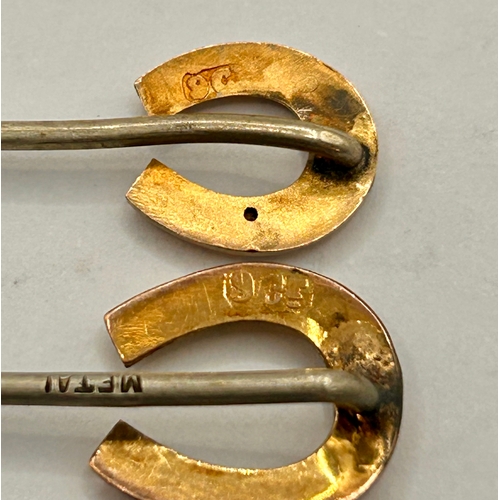 268 - Two 9Ct Gold Horse Shoe Finial Hat Pins . Largest 5.5cm x 1cm, 1.4Grams.  (2)