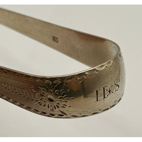 270 - Georgian Silver Hallmarked Engraved H*S Sugar Tongs. 13cm x 1.5cm, 26.8Grams.