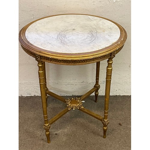 27 - Oval Marble Top Gilt Wood Table. 66 x 56 x 79 cms