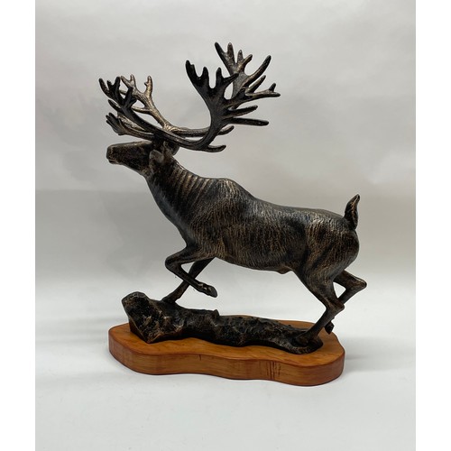 181 - Large Bronzed  Cast Iron Figure Of A Stag Mounted On Wood Plinth. 43 cms High x 38 cms