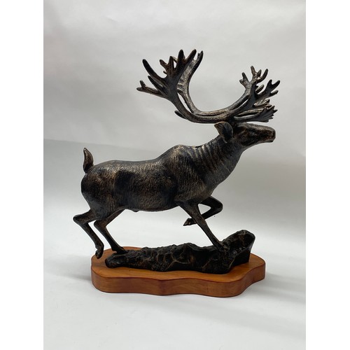 181 - Large Bronzed  Cast Iron Figure Of A Stag Mounted On Wood Plinth. 43 cms High x 38 cms