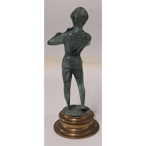 184 - Brass Figure with a Patinated Finish of a boy playing a Wind instrument, 25cm tall