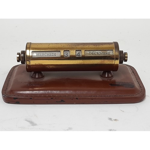 190 - Brass Desk Top Calendar on Leather Plinth 11.5cm long