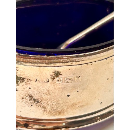 202 - Blue Glassed Silver Hallmarked Four Footed Salt Cellar To Include A Silver Hallmarked Spoon. 5.5cm x... 