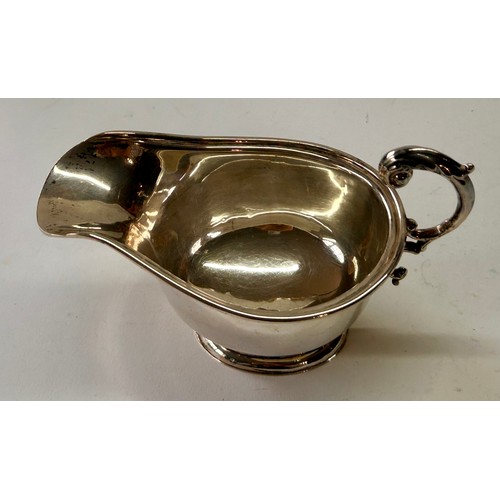 204 - Silver Hallmarked Handled Gravy Boat. 16cm x 9cm x 10cm, 88.8Grams.