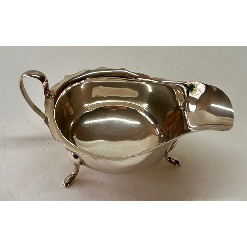 209 - Three Lion Paw Style Footed Silver Hallmarked Gravy Boat. 15cm x 9cm x 6cm, 101.4Grams.