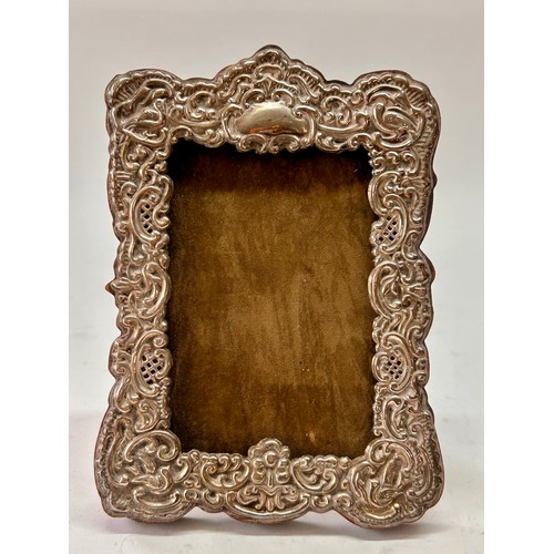 211 - Sterling Silver Decorative Wooden Backed Stand Picture Frame. 21cm x 15cm.