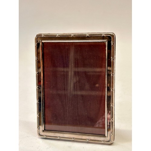 213 - Silver Plated Stand Picture Frame Stamped Sheffield. 15cm x 11cm.