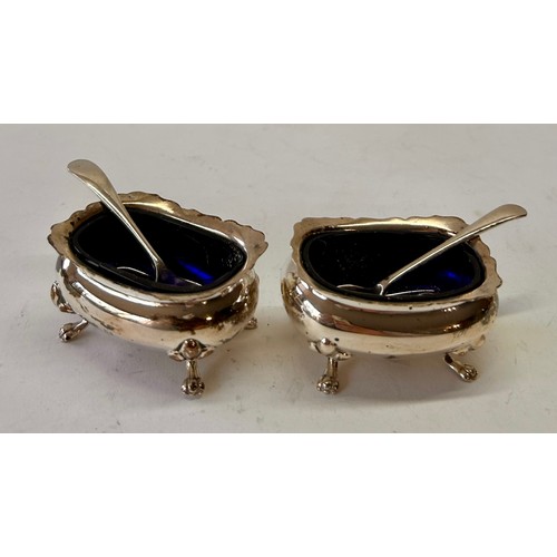 220 - Pair Of Four Footed Silver Hallmarked Blue Glass Salt Cellars To Include Two Silver Hallmarked Spoon... 