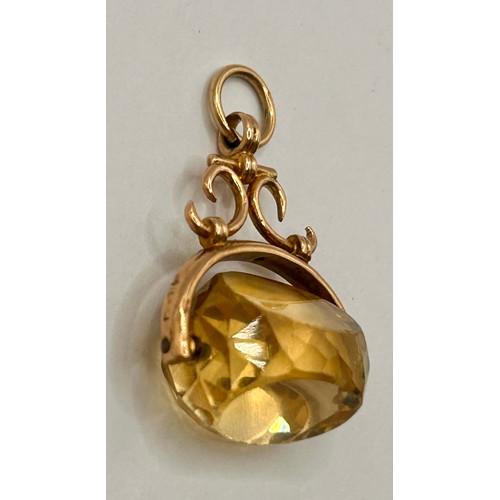 93 - 9Ct Gold Hallmarked Citrine Spinner Fob Pendant. 6cm x 3cm, 6.27Grams.