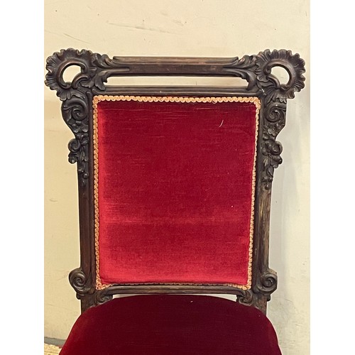 19 - Antique Upholstered Chair With Carved Decoration.