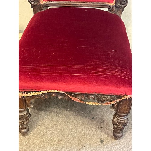 19 - Antique Upholstered Chair With Carved Decoration.