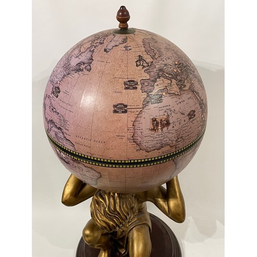 47 - Revolving Globe Bar / Wine Stand In The Form Of Atlas With The Globe On His Shoulders.84 cms High