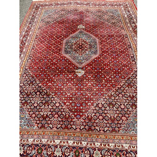 72 - Large Hand Made Decorative Rug. 356cm x 250cm.
