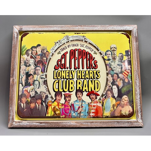 508 - Wooden Framed Metal Advertising Sign For SGT. Peppers, Lonely Hearts Club Band. 44cm x 34cm.