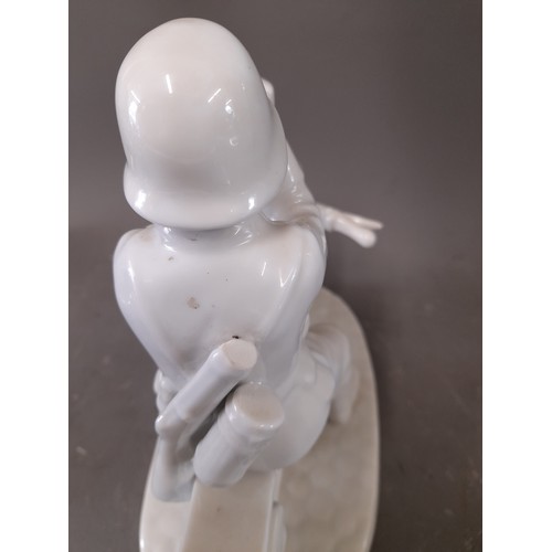 162 - White Porcelain German Motor cycle despatch rider with Cobalt Blue Mark KPM under stylised Third Rei... 