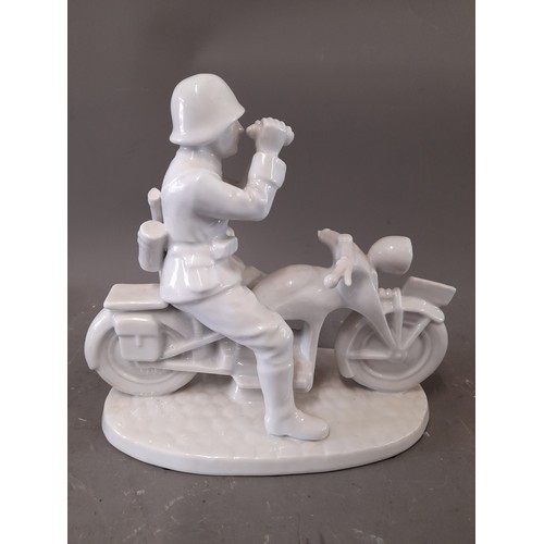 162 - White Porcelain German Motor cycle despatch rider with Cobalt Blue Mark KPM under stylised Third Rei... 