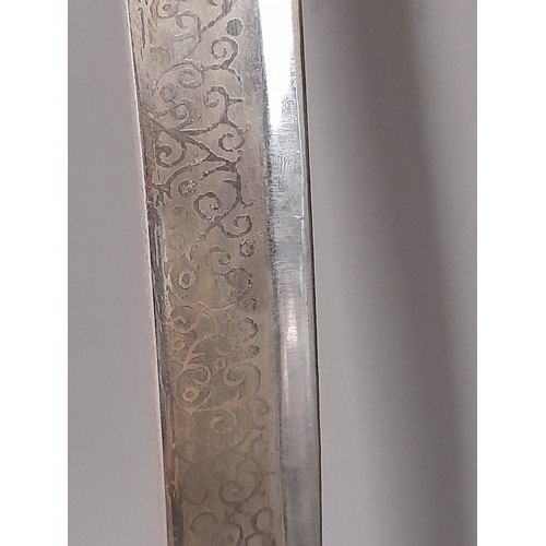 168 - Indian Tulwaar Sword with etched Blade and Velvet covered Sheath, overall length 70cm