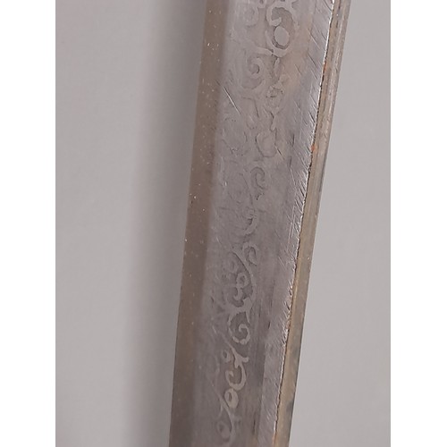 168 - Indian Tulwaar Sword with etched Blade and Velvet covered Sheath, overall length 70cm