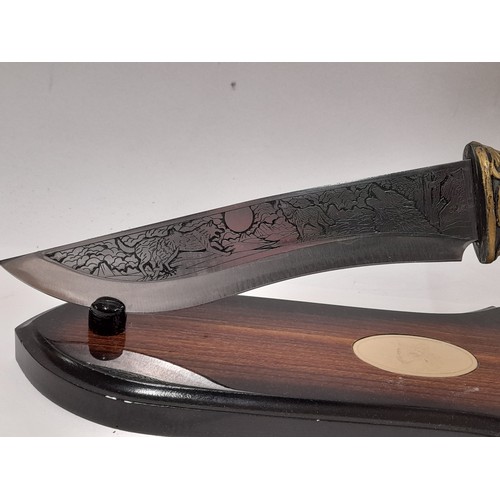 172 - Ornamental Knife on Stand with Resin Wolf Head, total length 34cm