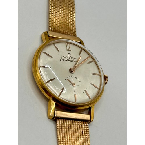 100 - 18Ct Gold Stamped 750 Omega Sea master Watch Along With 18Ct Gold Strap.  55.7Grams. 23cm.