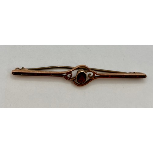 108 - 9Ct Gold Single Gem Stone Set Decorative Pin Broach. 6cm, 2.14Grams.